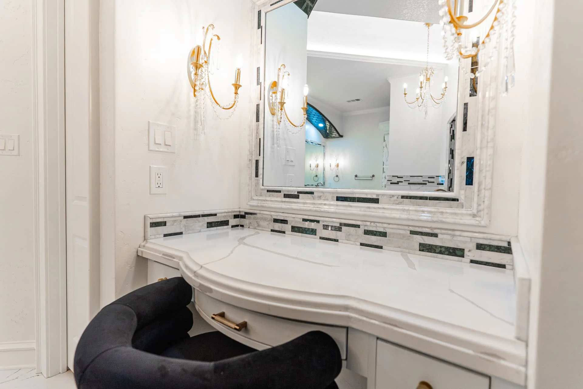 Bathroom vanity and decorative mirror at The Flores Estate