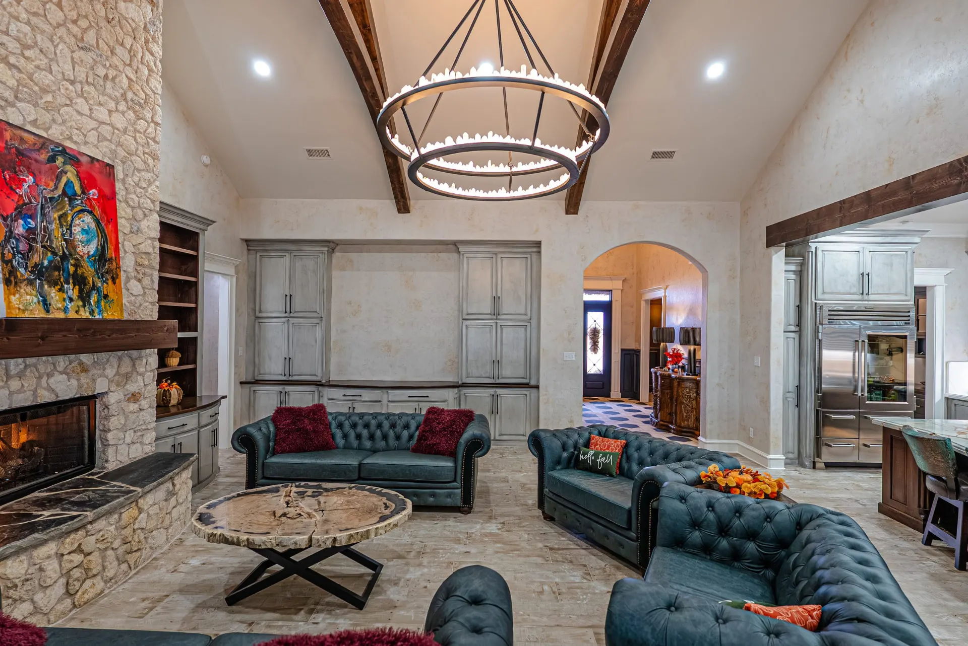Great room at 5 Prairie Ln with built-in cabinetry and live-edge coffee table
