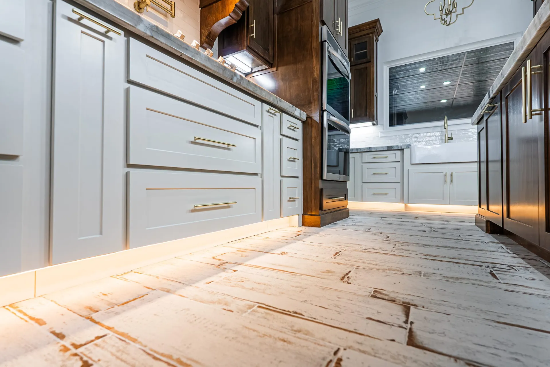 Under-cabinet LED lighting along the island at 1607 NW 12th St