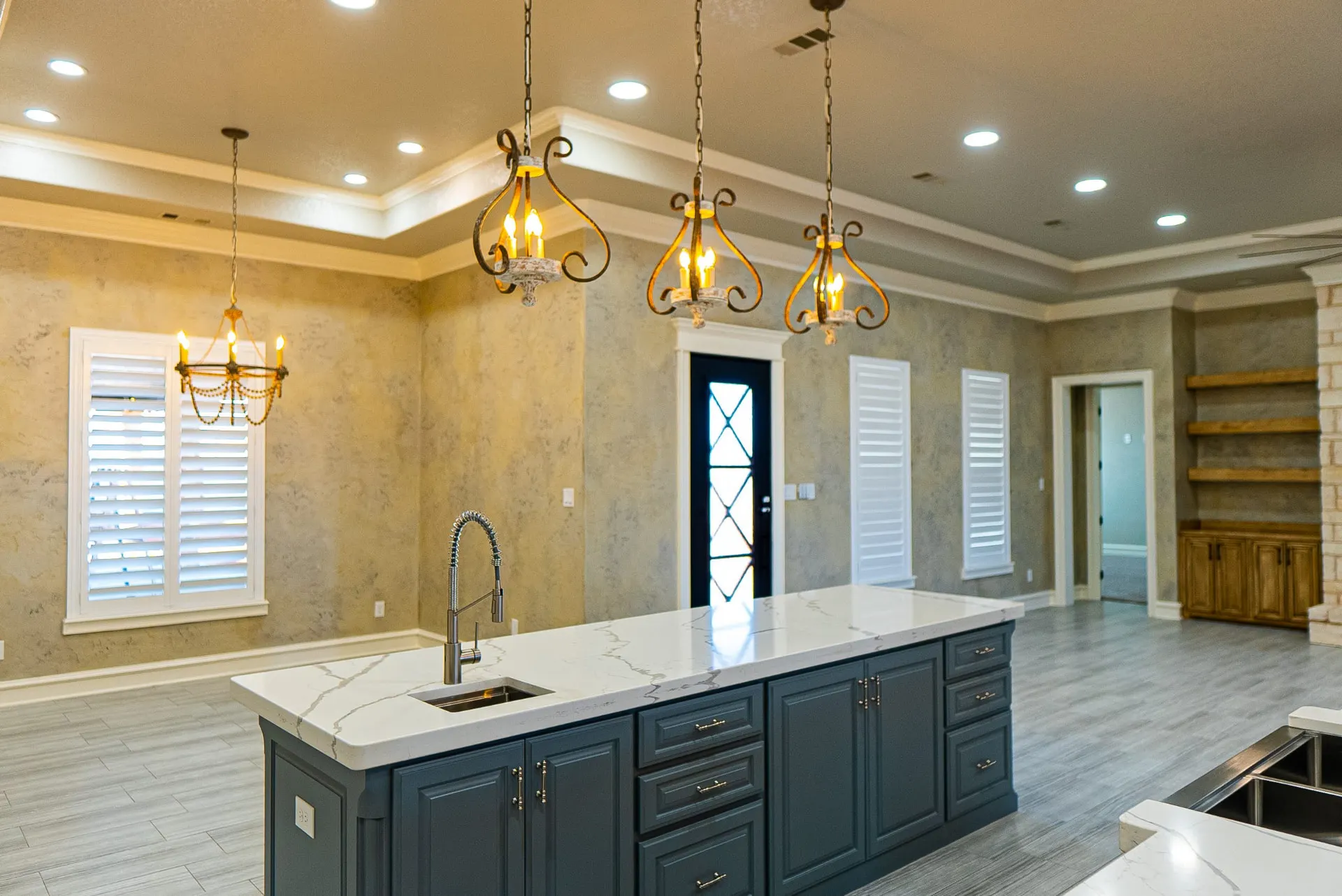 Kitchen island prep sink with a stainless gooseneck faucet at 1501 NW 12th St